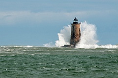 Large Wave Covers Whaleback Lighthouse Tower in Maine